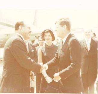 Photograph of President Kennedy and Mrs. Kennedy Greeting President of Pakistan, Muhammed Ayub Khan