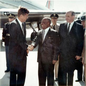 Photograph of President Kennedy with Secretary of State Rusk Greeting President Abboud of Sudan