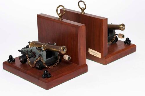 Bookends with Models of the USS Constitution Cannons