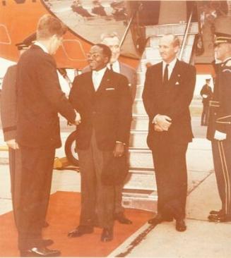 Photograph of President Kennedy Greeting President Leopold Sedar Senghor, President of Senegal