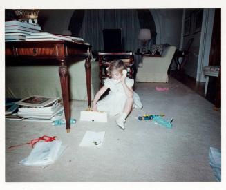 Photograph of Caroline Kennedy Playing with Birthday Gifts