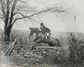 Photograph of Jacqueline Kennedy Onassis on Horseback