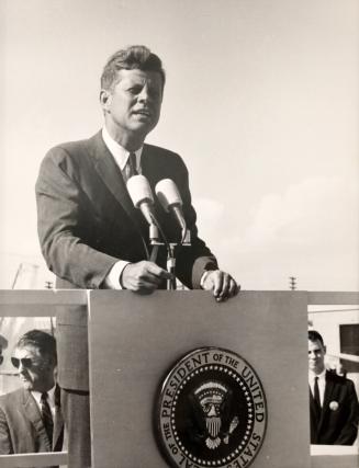 Photograph of JFK at a Podium