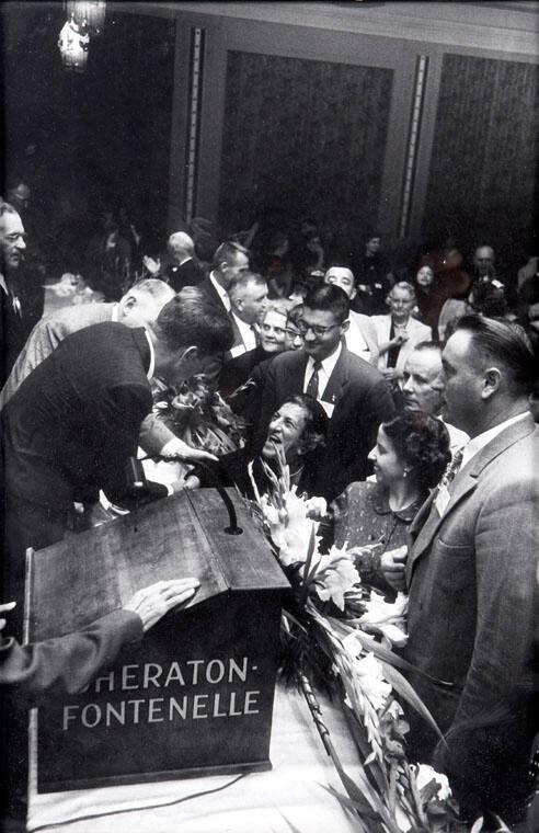 Photograph of John F. Kennedy Shaking Hands with Crowd