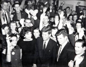 Photograph of John F. Kennedy with Jacqueline and Edward Kennedy Surrounded by Supporters
