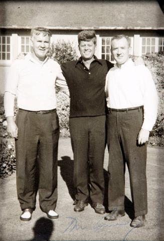 Photograph of John F. Kennedy with Paul "Red" Faye and unidentified Man