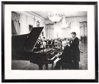 Photograph of President Harry Truman Playing Piano at the White House