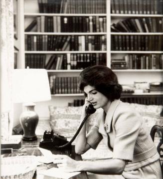 Photograph of Jacqueline Kennedy at Desk