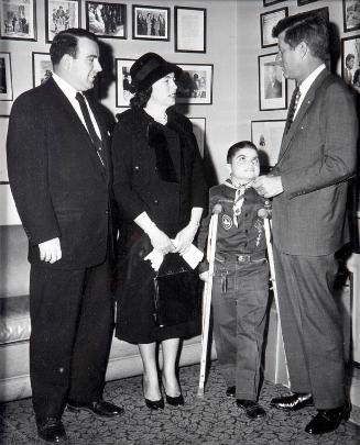 Photograph of Senator John F. Kennedy with Cub Scout