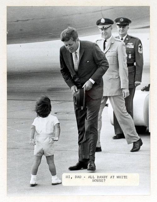 Photograph of President Kennedy Greeted by John F. Kennedy, Jr.