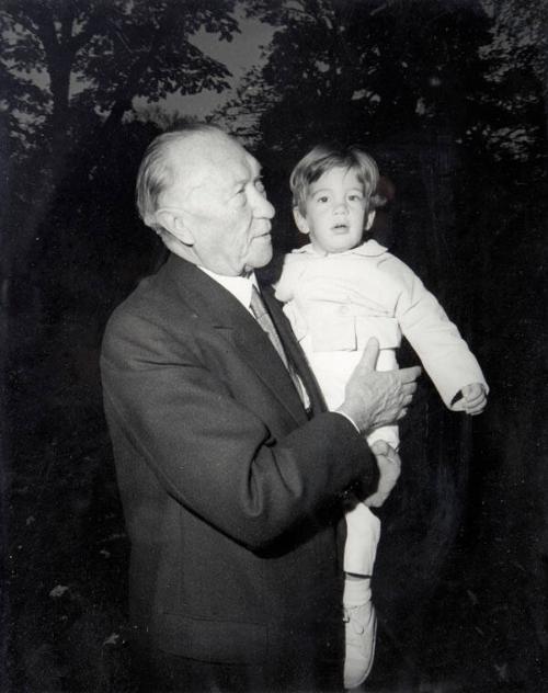 Photograph of Konrad Adenauer Holding John F. Kennedy, Jr.