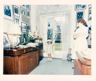 Photograph of John F. Kennedy, Jr. Wearing Marine Officers Cap