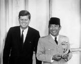 President John F. Kennedy stands with President of Indonesia Ahmed Sukarno outside the North en…